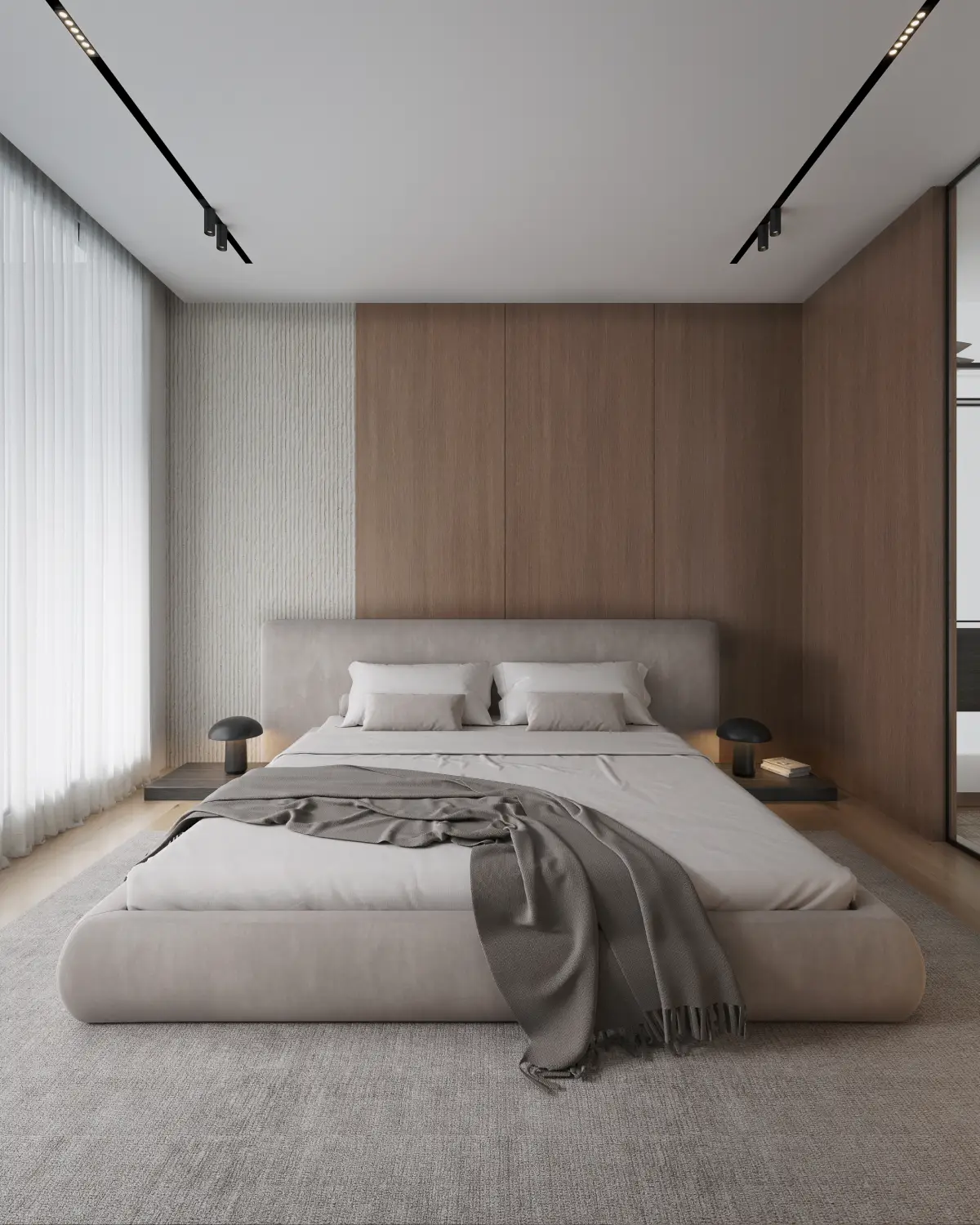 The Grid House fourth bedroom render. Grey upholstered bed with walnut paneled feature wall, mushroom-shaped black bedside lamps, fluted accent wall, residential interior, Lahore.