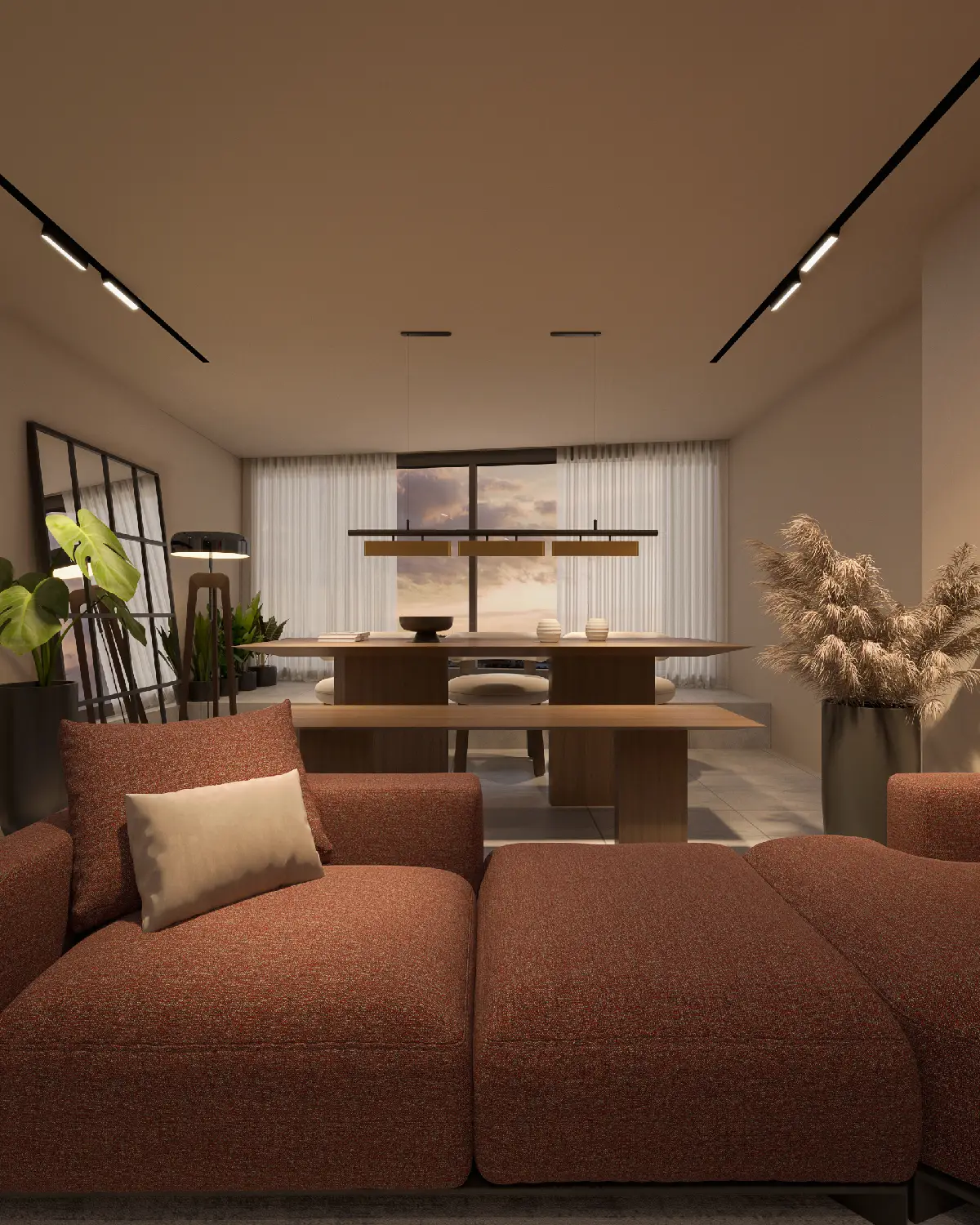 Z Apartments unit living looking to dining render. Terracotta sofa cushion in foreground, walnut dining table with linear pendant, leaning floor mirror, dried pampas grass, multi-unit residential interior concept, Islamabad.